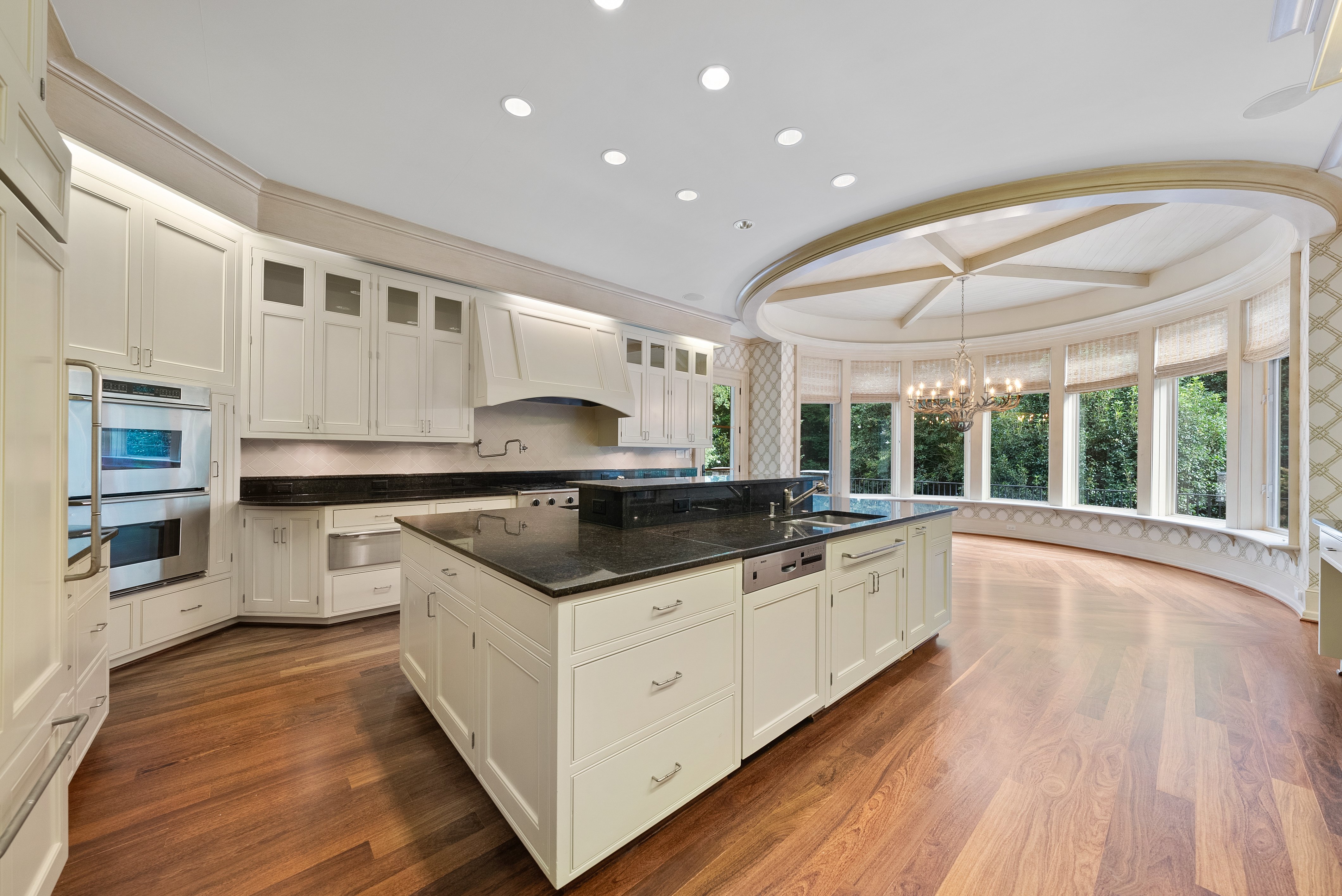 Grand kitchen with rounded bay-window area