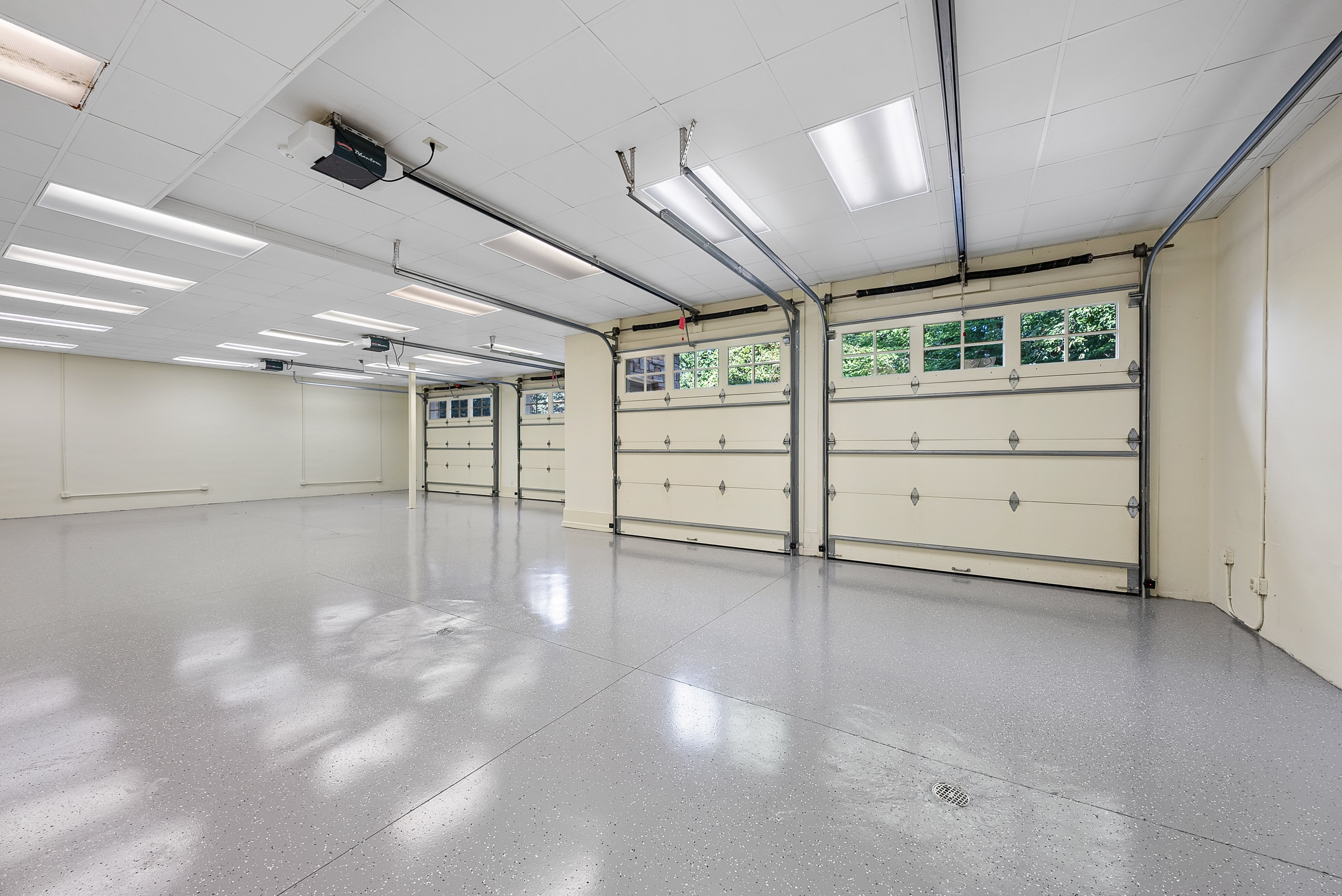 Interior of a garage with four doors