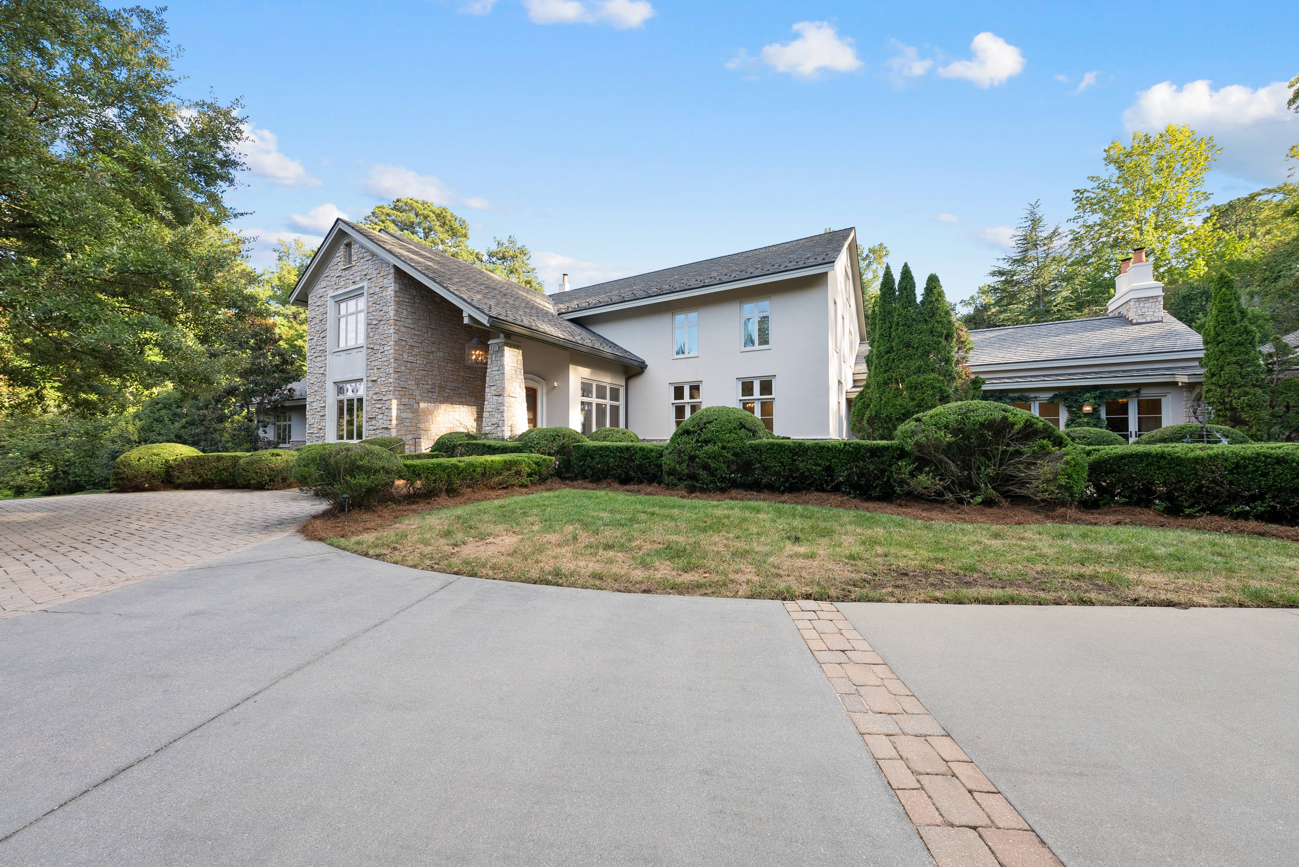 An approach view of the home, from the driveway.